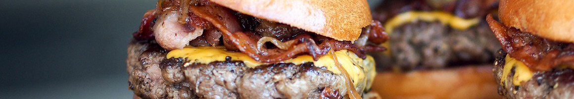 Eating Burger at Quik Burger restaurant in Cleveland, TN.
